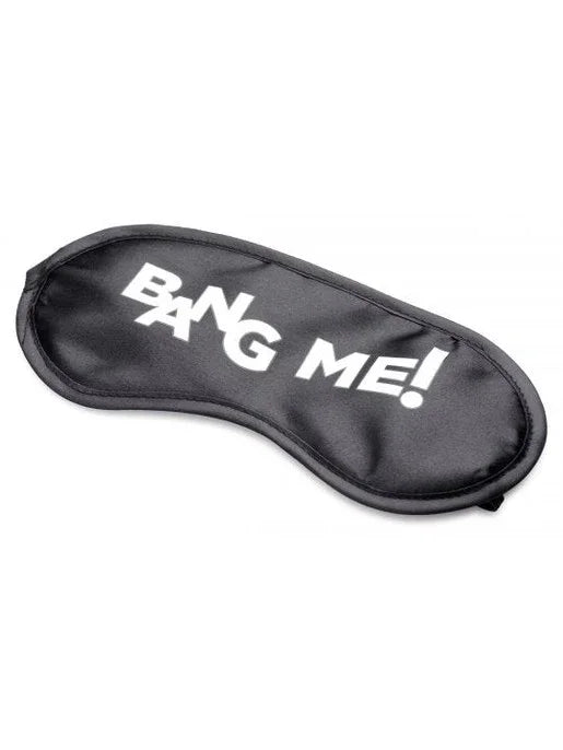 Black sleep mask with 'Bang Me!' text on a white background