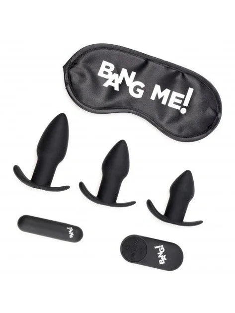 Black eye mask with 'Bang Me!' text and black silicone plugs on a white background