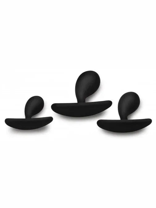Three black spoon-shaped objects on a white background