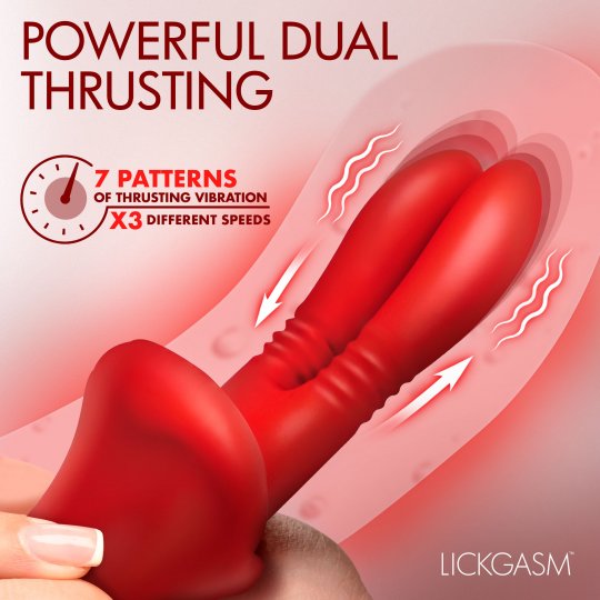 Red dual-stimulation adult novelty device with a hand holding the base, shown against a pink graphic background with text reading 'POWERFUL DUAL THRUSTING' and '7 PATTERNS OF THRUSTING VIBRATION x3 DIFFERENT SPEEDS'. Brand name LICKGASM appears in the lower right.