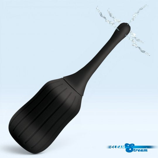 Black spatula with water droplets on a light blue background, featuring the CleanStream brand.