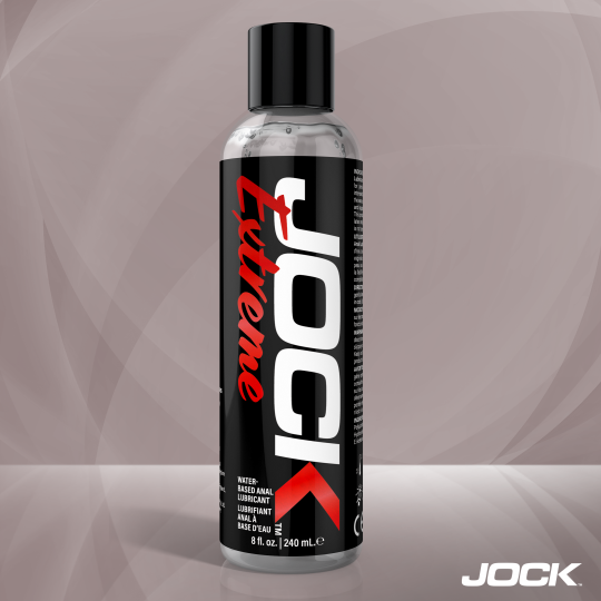 JOCK Extreme lubricant bottle on a gray background