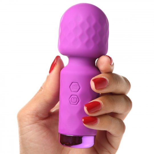 Purple handheld device held by a hand with red nail polish on a white background