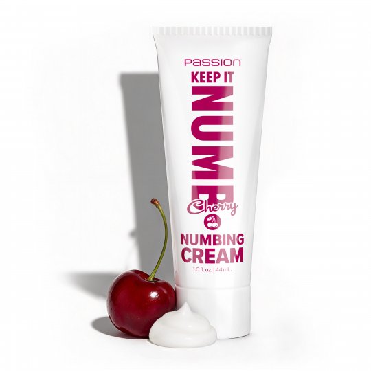 Tube of 'Passion Keep It Nume Cherry Numbing Cream' with a cherry on a white background
