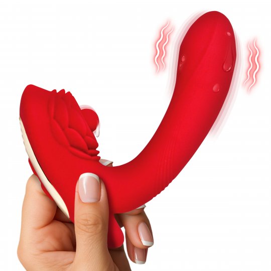 Red silicone product held by a hand with a white background