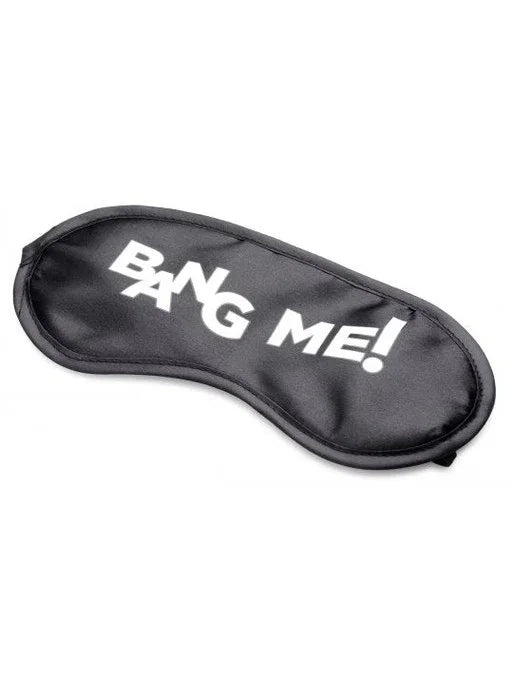 Black sleep mask with 'Bang Me!' text on a white background