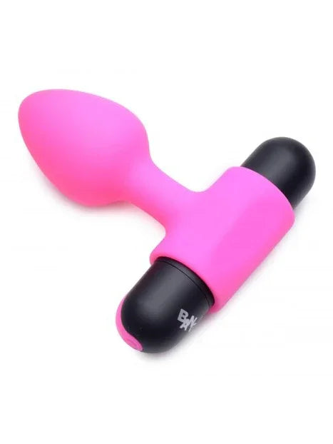 Pink and black Y-shaped object on a white background