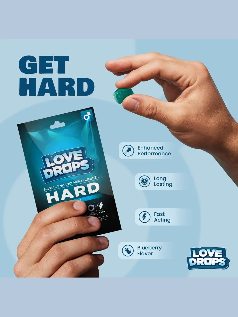 Hand holding a packet of Love Drops sexual enhancement gummies with product details on a blue background.
