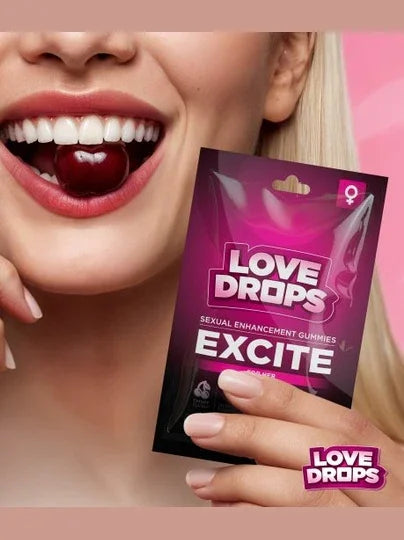 Woman holding a 'Love Drops Excite' package with a pink background